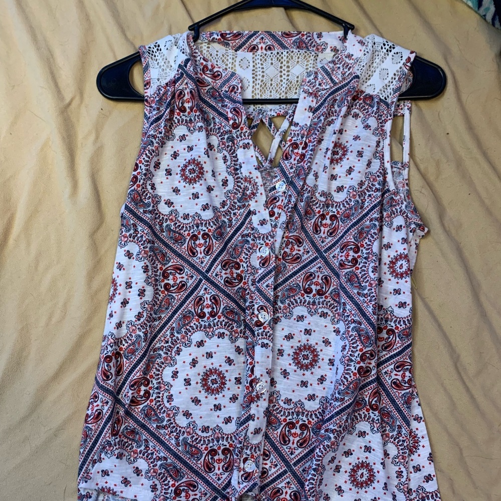 no tags but assuming no boundaries brand, tribal pattern, fits like a medium